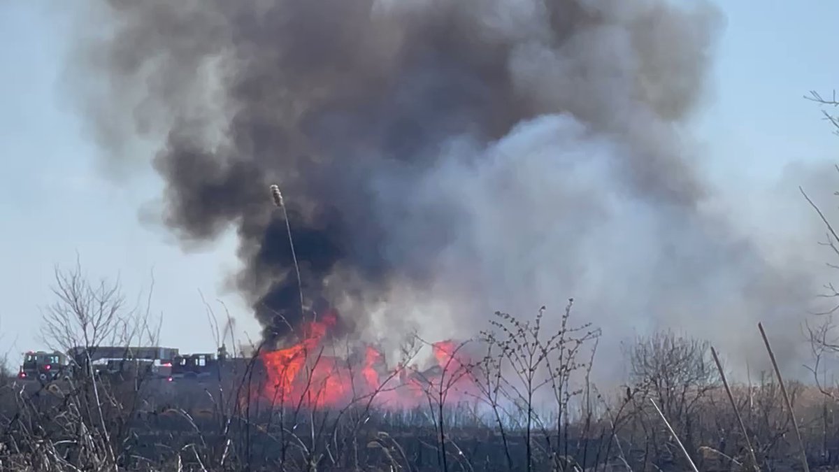 Large brush fire ongoing in Stratford, CT in marshland adjacent to Sikorsky airport. Wind is whipping and progress is being made, but flare-ups continue. 