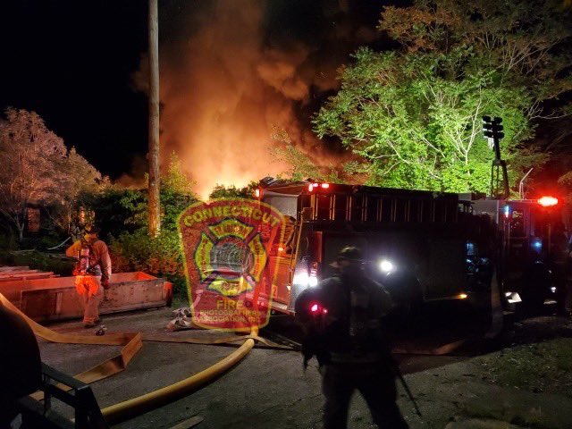 N scene of a 3rd alarm fire in a vacant, mill in Norwich, CT.   fire to be in a collapsed section that had previously burned a few years ago