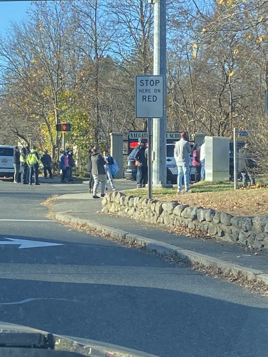 Scene outside of Naugatuck HS where parents are responding to a lockdown situation on campus. 