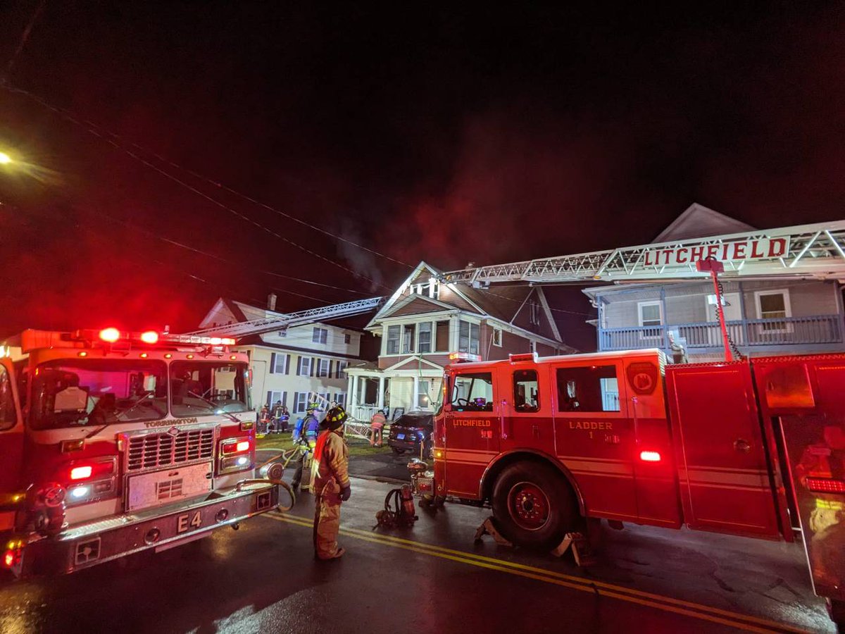 A dog died in a two-alarm house fire that displaced five people early this morning in Torrington