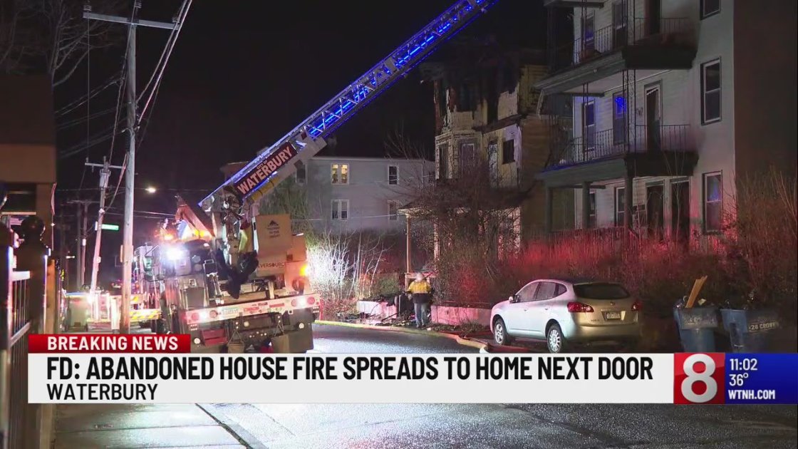 Firefighters responded to a blaze Monday night at an abandoned home on Crown Street in Waterbury that spread to the home next door