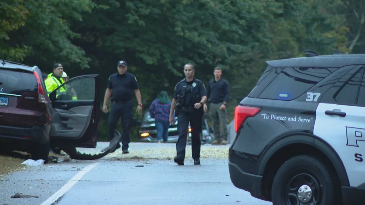 Four people are in the hospital after being extricated from a car that collided with a corn truck in Stonington